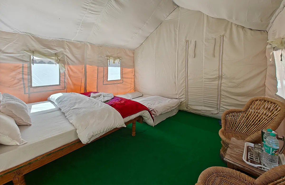 deluxe-swiss-tent-with-extra-bed-and-seating-area